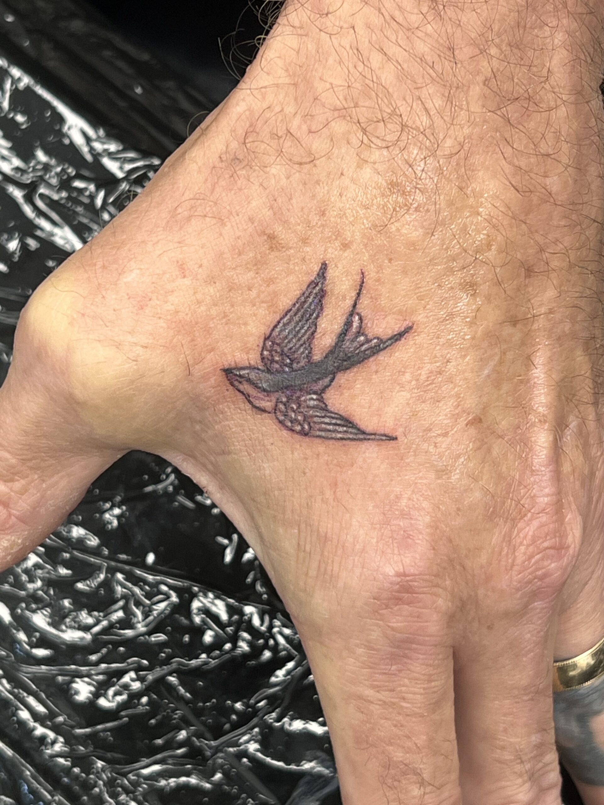 swallow tattoo fine line small hand tattoo